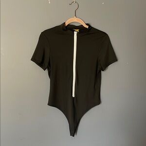 Daisy Black Garment with Yellow Tag